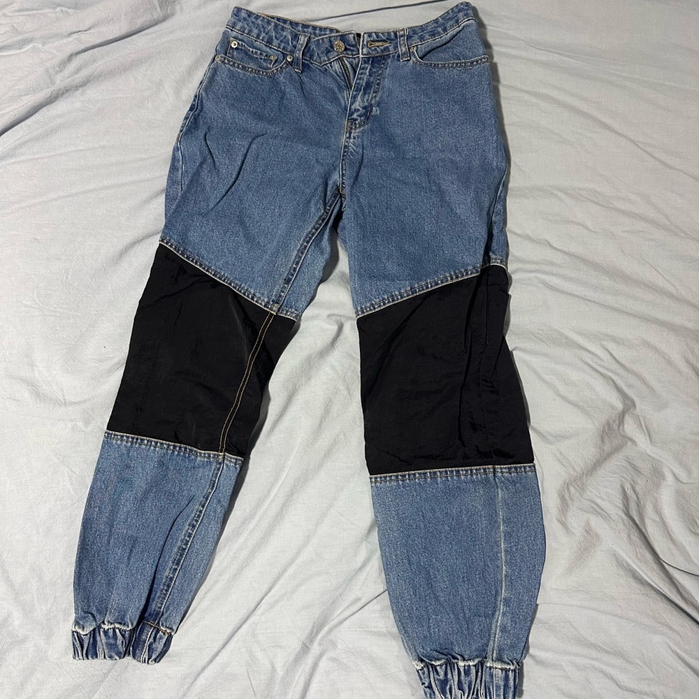 BDG jeans with black patchwork knees